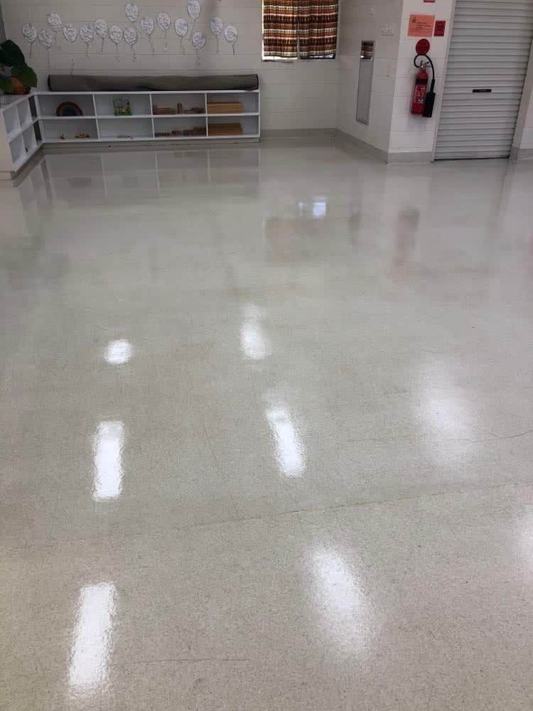 A Room With a Shiny Floor and a Fire Extinguisher on the Wall — NQW Services In Cardwell, QLD