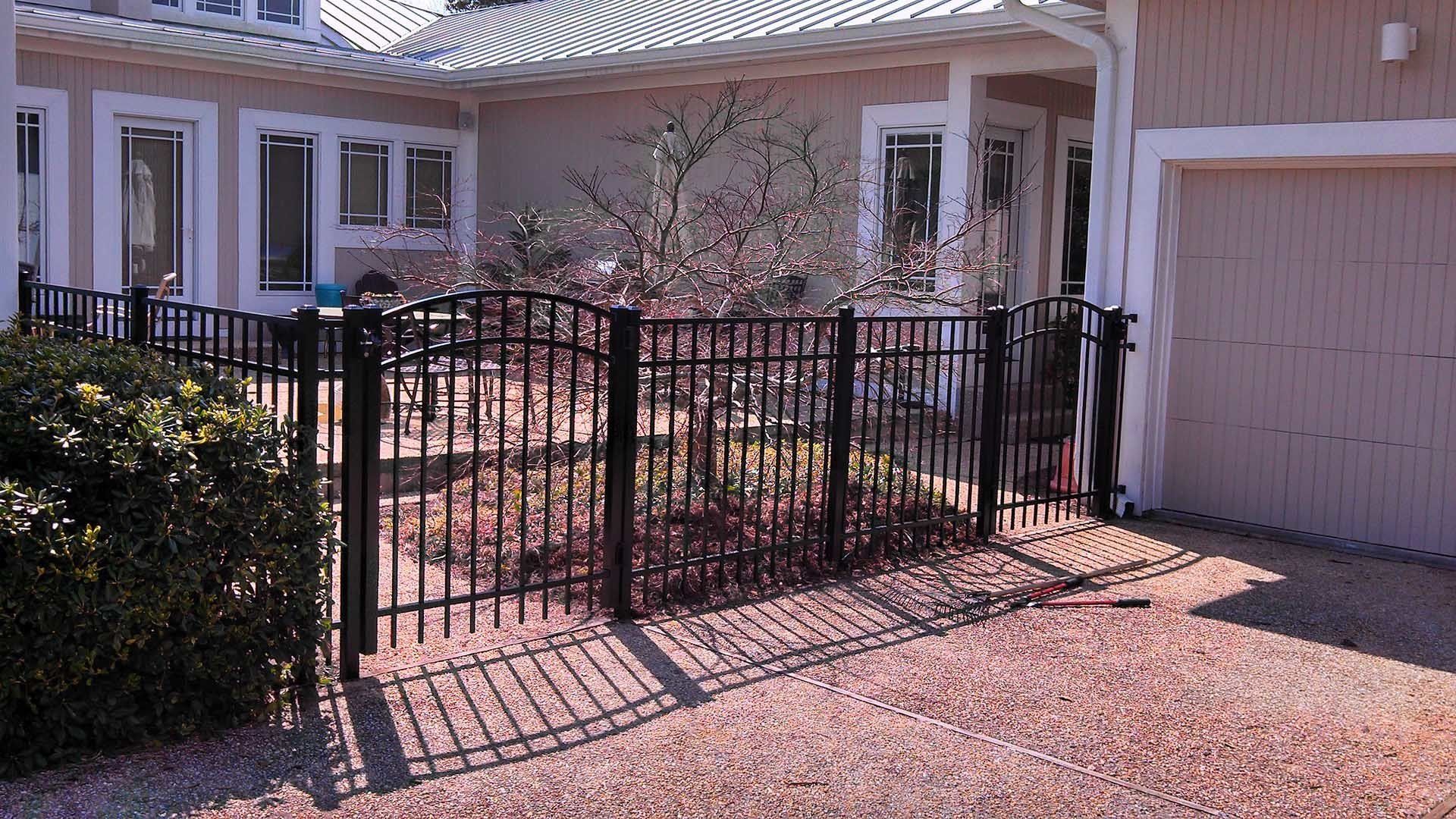 Black Fence With Gate — Wilmington,  NC — J & J Fence