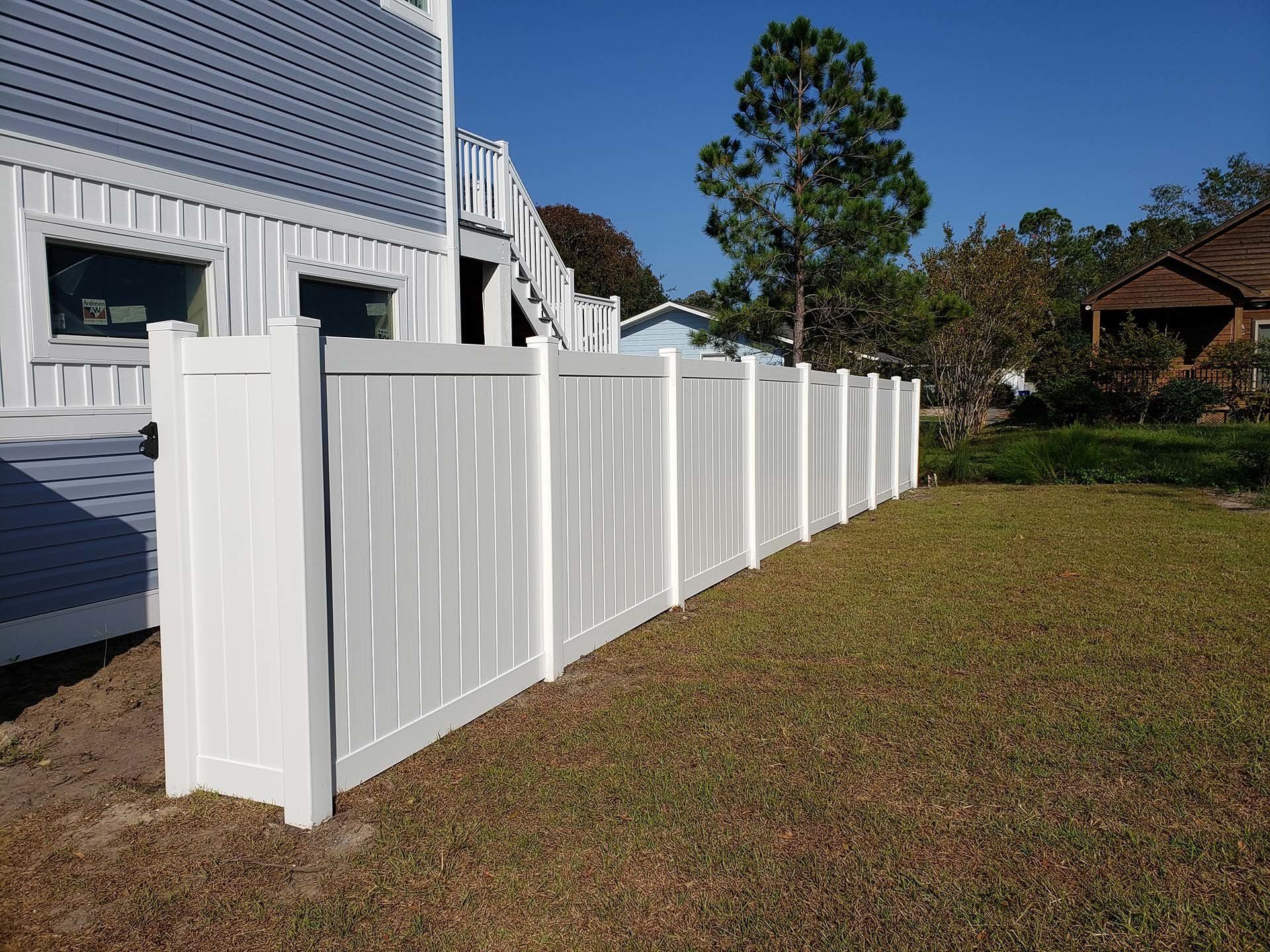 White Backyard Fence — Wilmington,  NC — J & J Fence