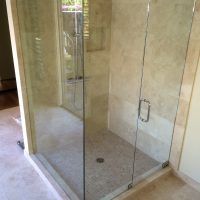 Example of 90° Shower Enclosure with fixed panel return. Door hinging from wall