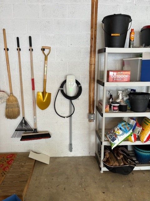 A long hallway with a lot of doors and lights