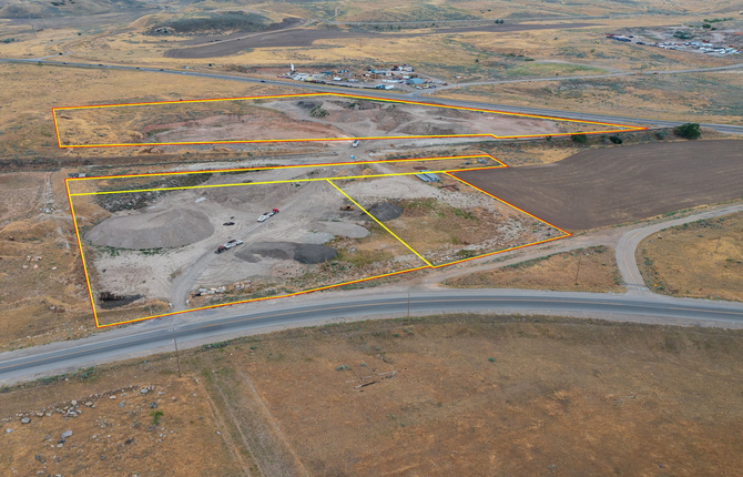 Aerial view of The Grove Industrial plot of land with digital plot lines of the location overlaid.