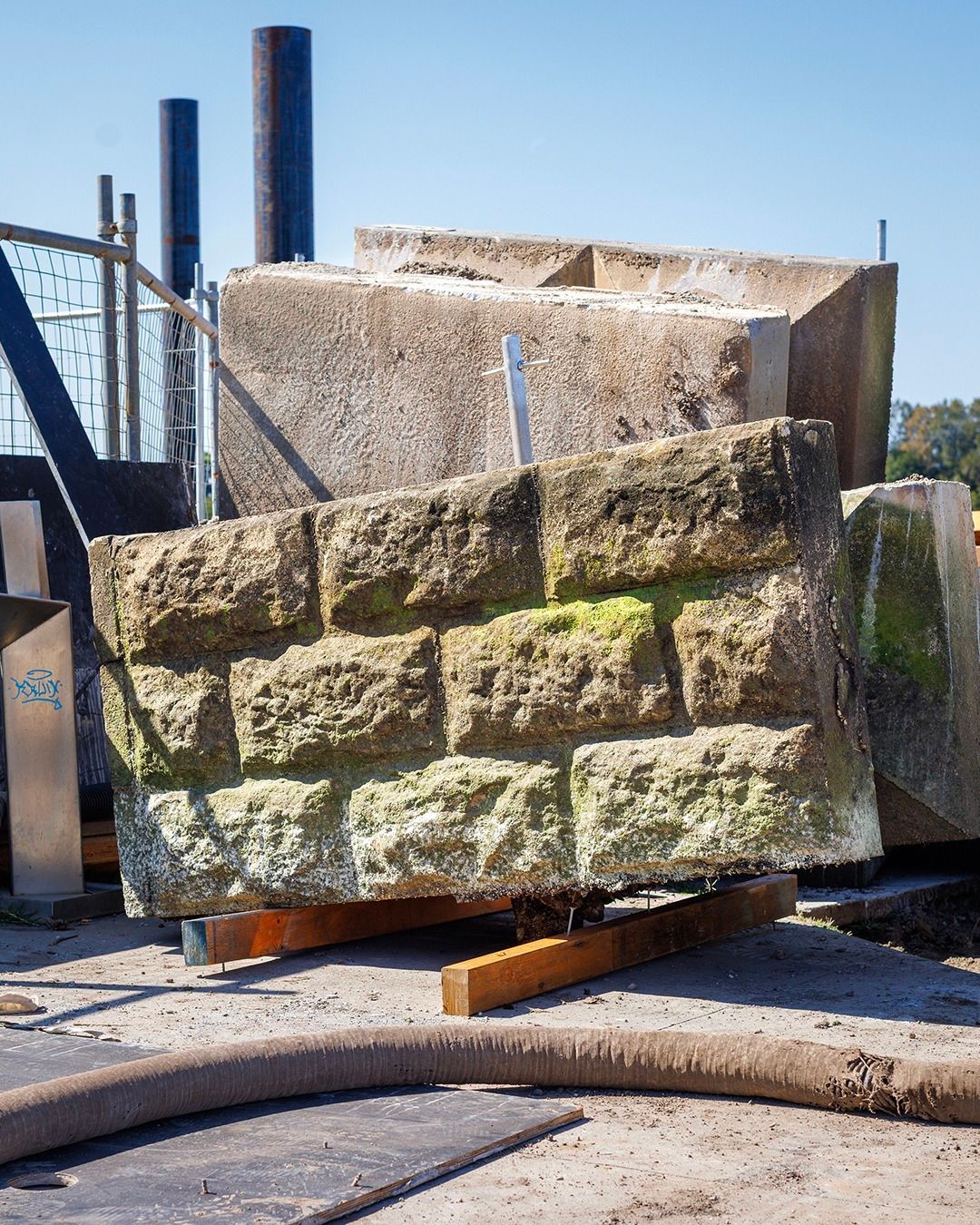 Stone Blocks with Rectangular Shapes, Some with Moss — M&J Marine Services in Lake Macquarie, NSW