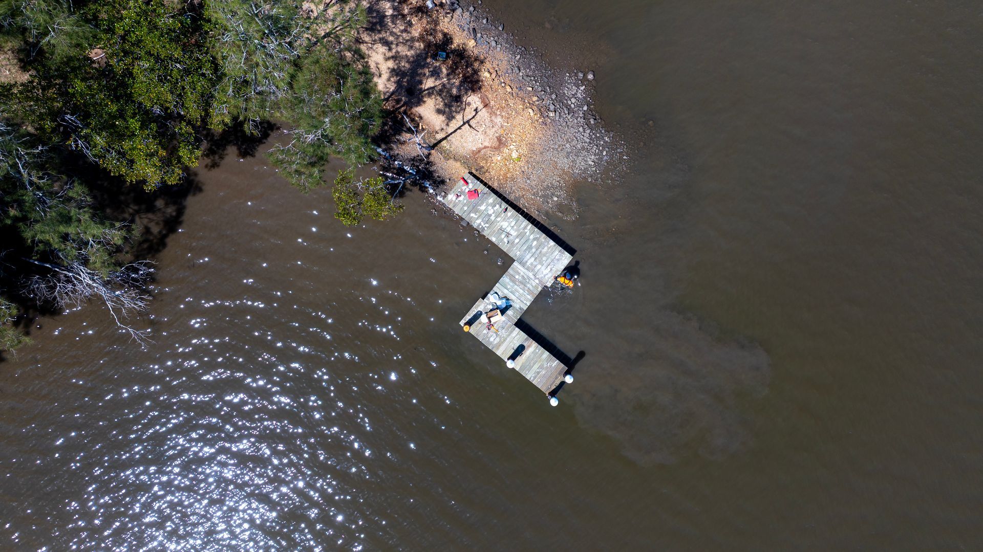 A Wooden Z Shaped Dock Extending Into a Body of Water — M&J Marine Services in Forster, NSW