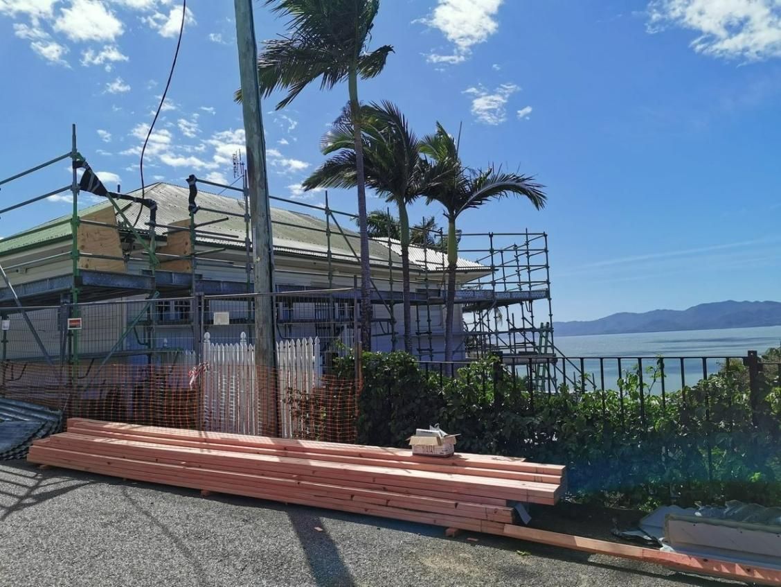 A Building Under Construction With A View Of The Ocean — Kosick Roofing NQ Pty Ltd In Mount Low, QLD