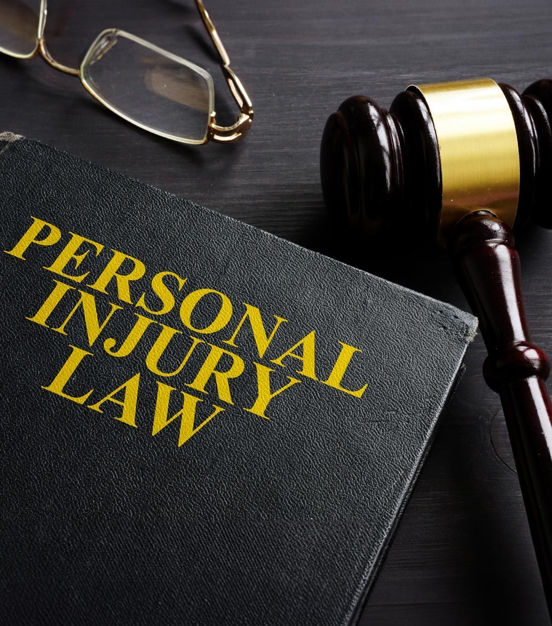 Personal Injury Law Book And Gavel — Cape Girardeau, MO — Remley Law Firm