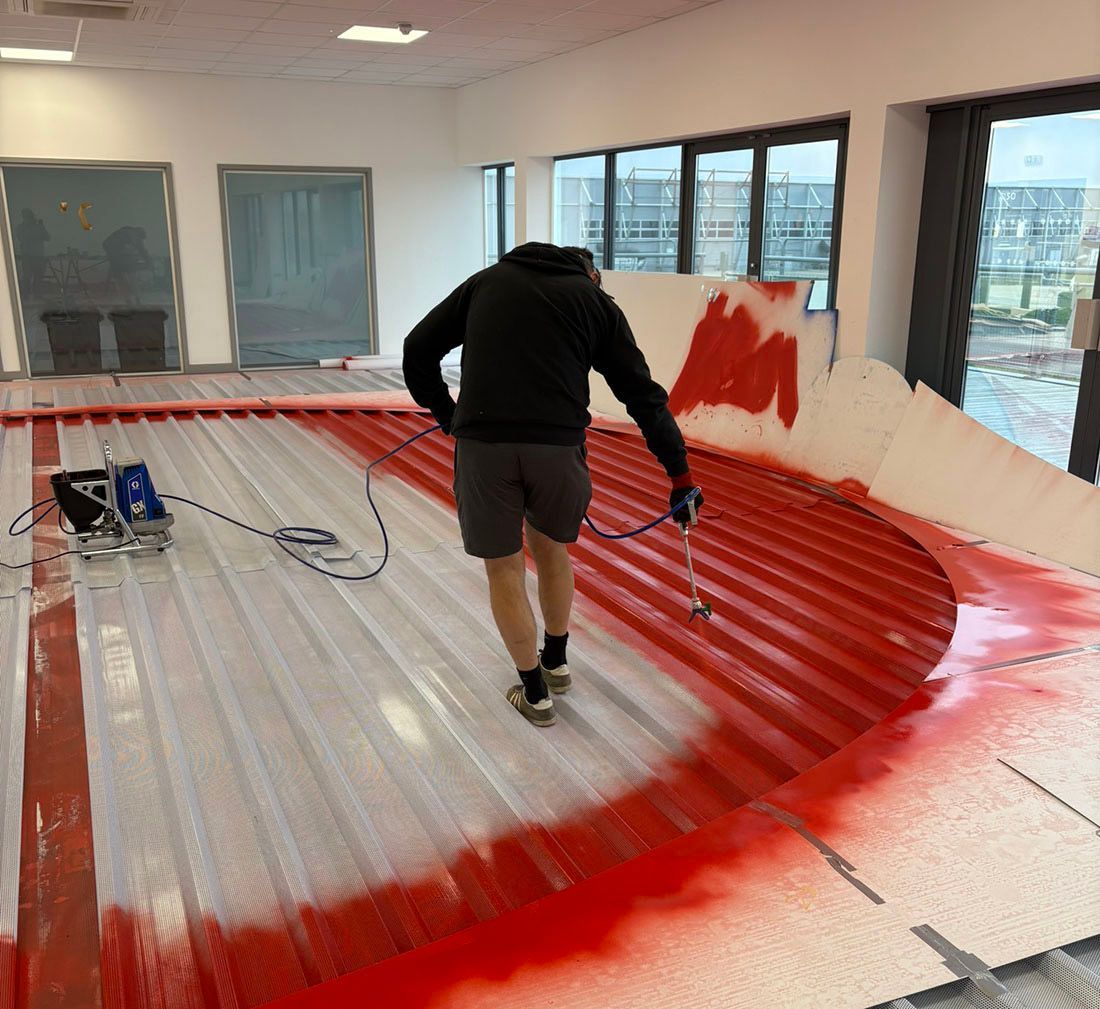 The Large Letter Company - Sisk large logo being spray painted