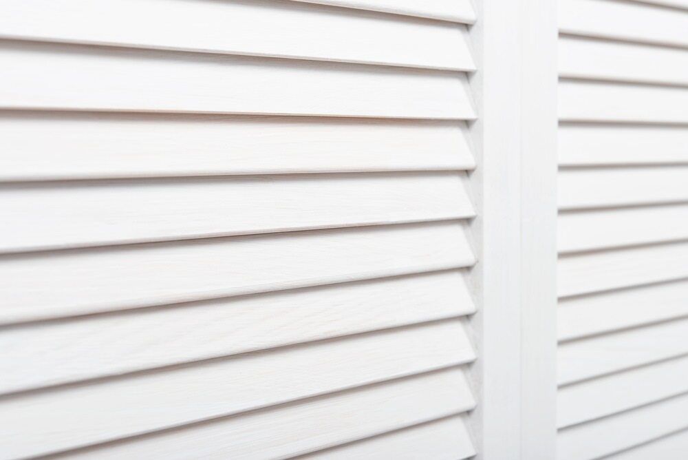 Window with closed shutters — Shutters in Cairns, QLD