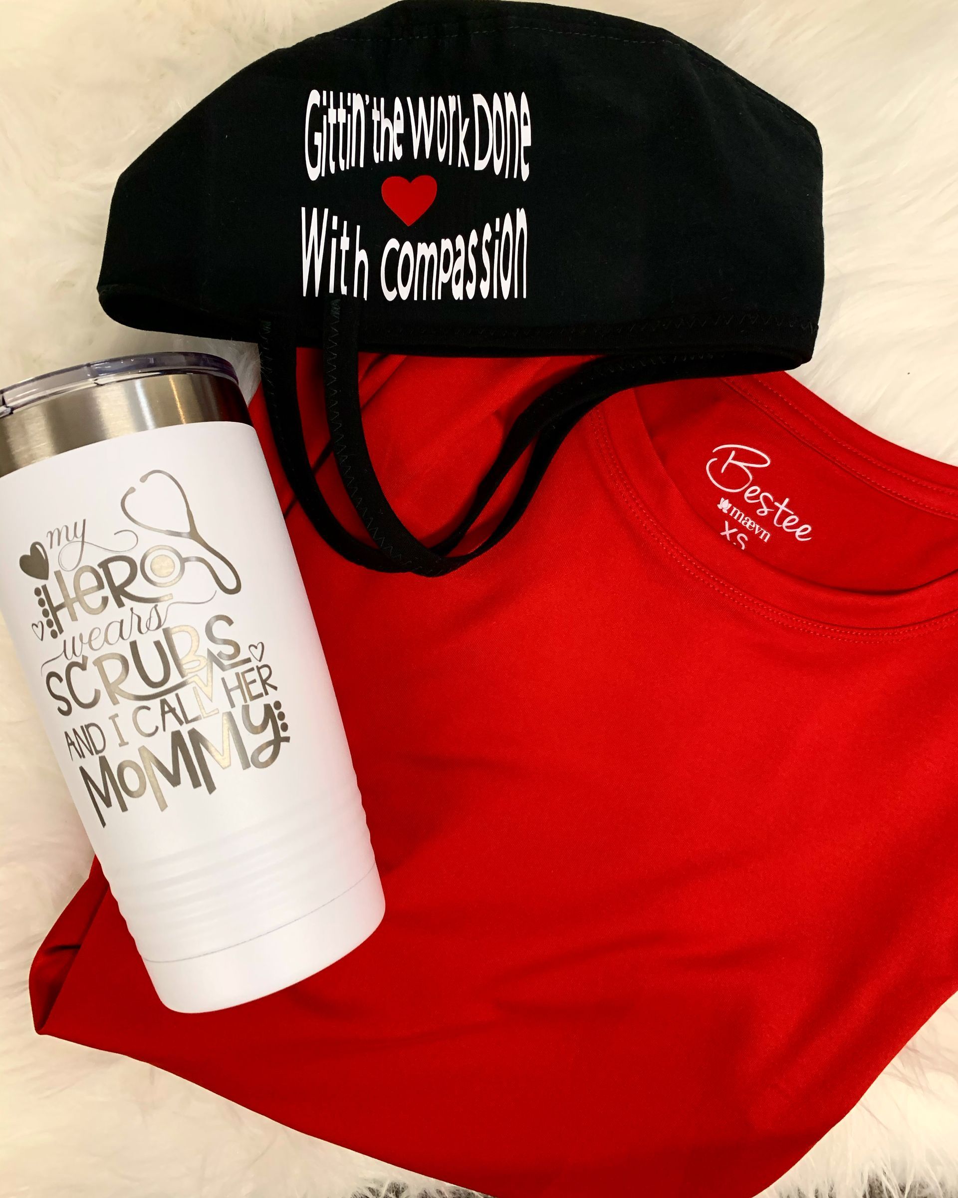 A white tumbler that says scrub mom on it