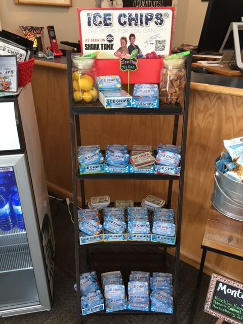 A display of ice chips and other snacks in a store