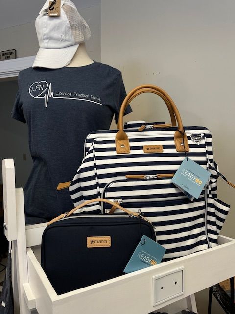 A black and white striped bag is on a shelf