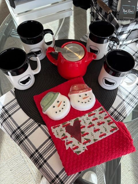 A white table with a bunch of items on it