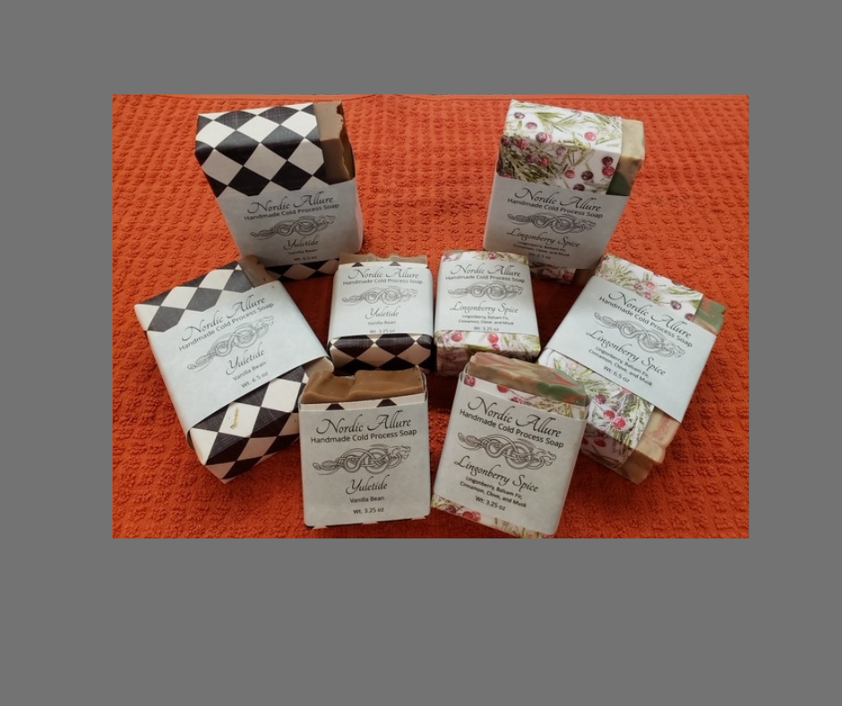 A group of soap bars sitting on top of each other on a table.