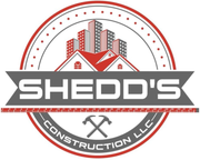 A logo for shedd 's construction llc with buildings on the roof