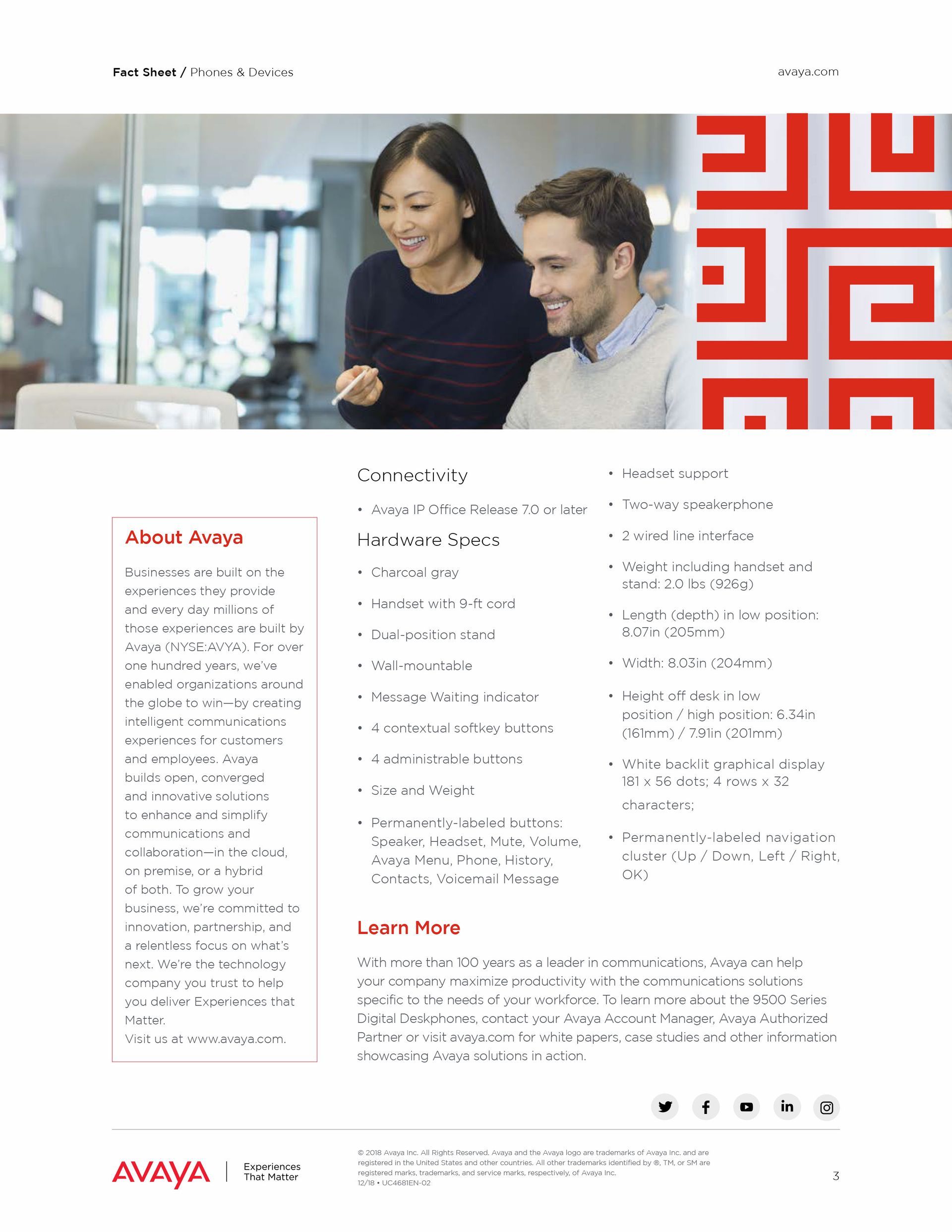 A man and a woman are looking at a laptop computer.