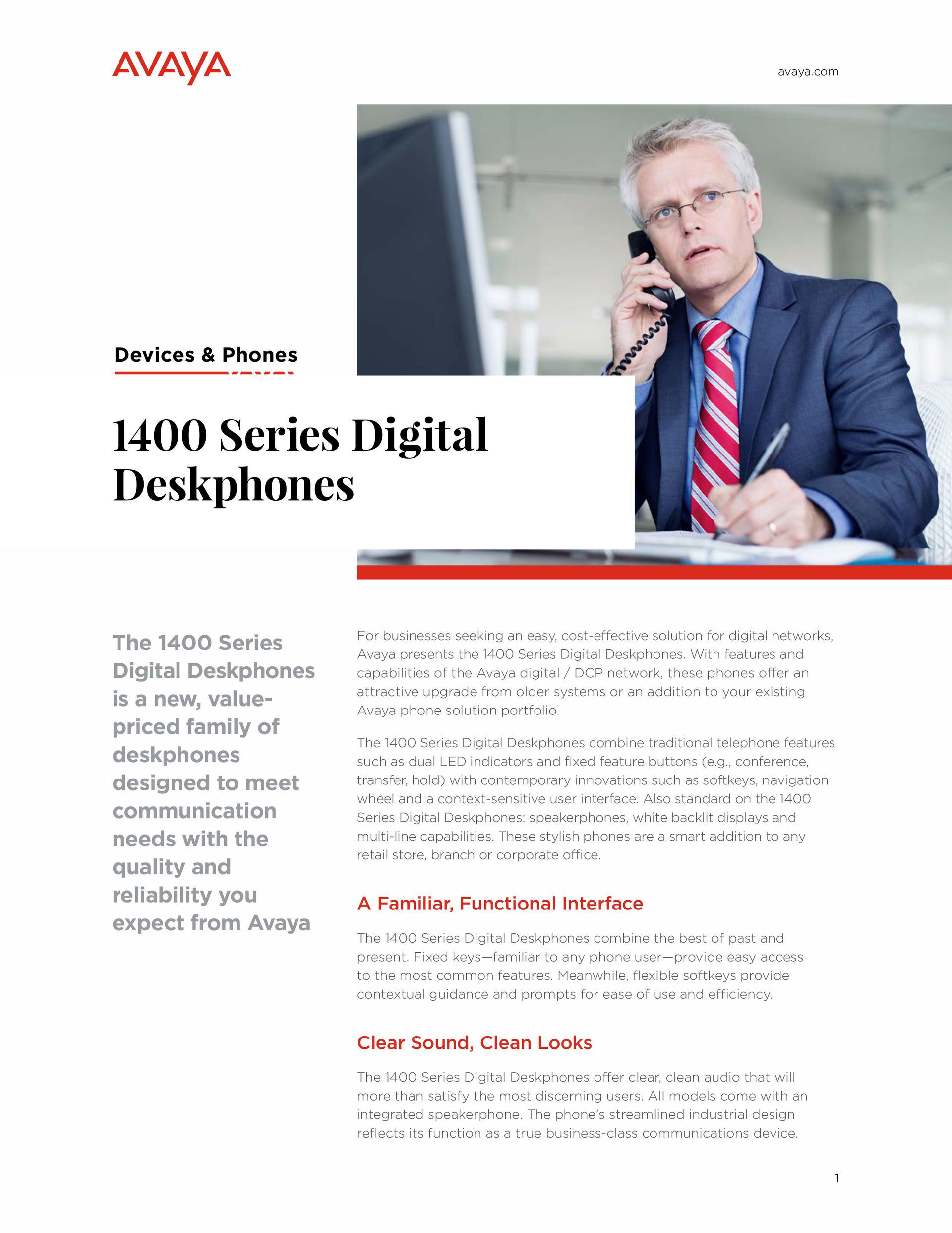 A man in a suit and tie is talking on a phone.