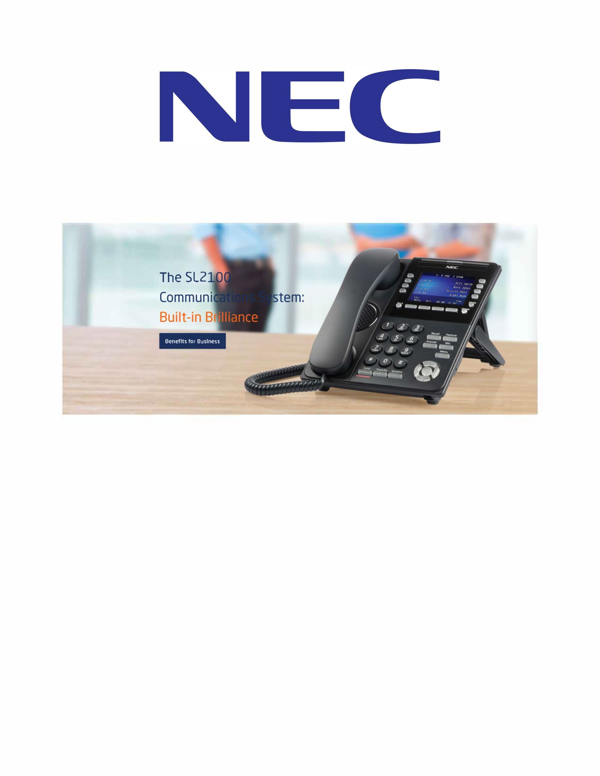 A nec telephone is sitting on a wooden table.