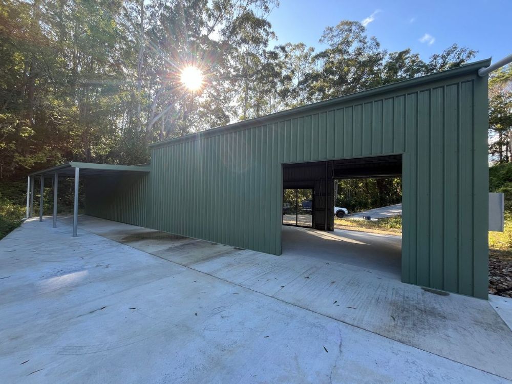 Sheds With Steel Walls And Roll-up Door With Door Latch Lock — Urbon Sheds in Uki, NSW