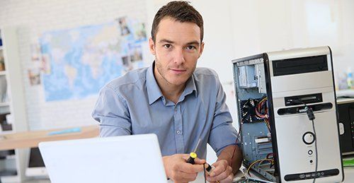 Man doing computer check up