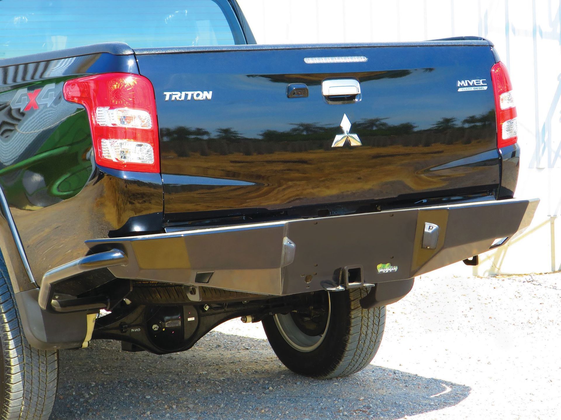 Black Mitsubishi Triton Pickup Truck With a Heavy-duty Rear Bumper — Stay on Track 4X4 Accessories in Gladstone Central, QLD