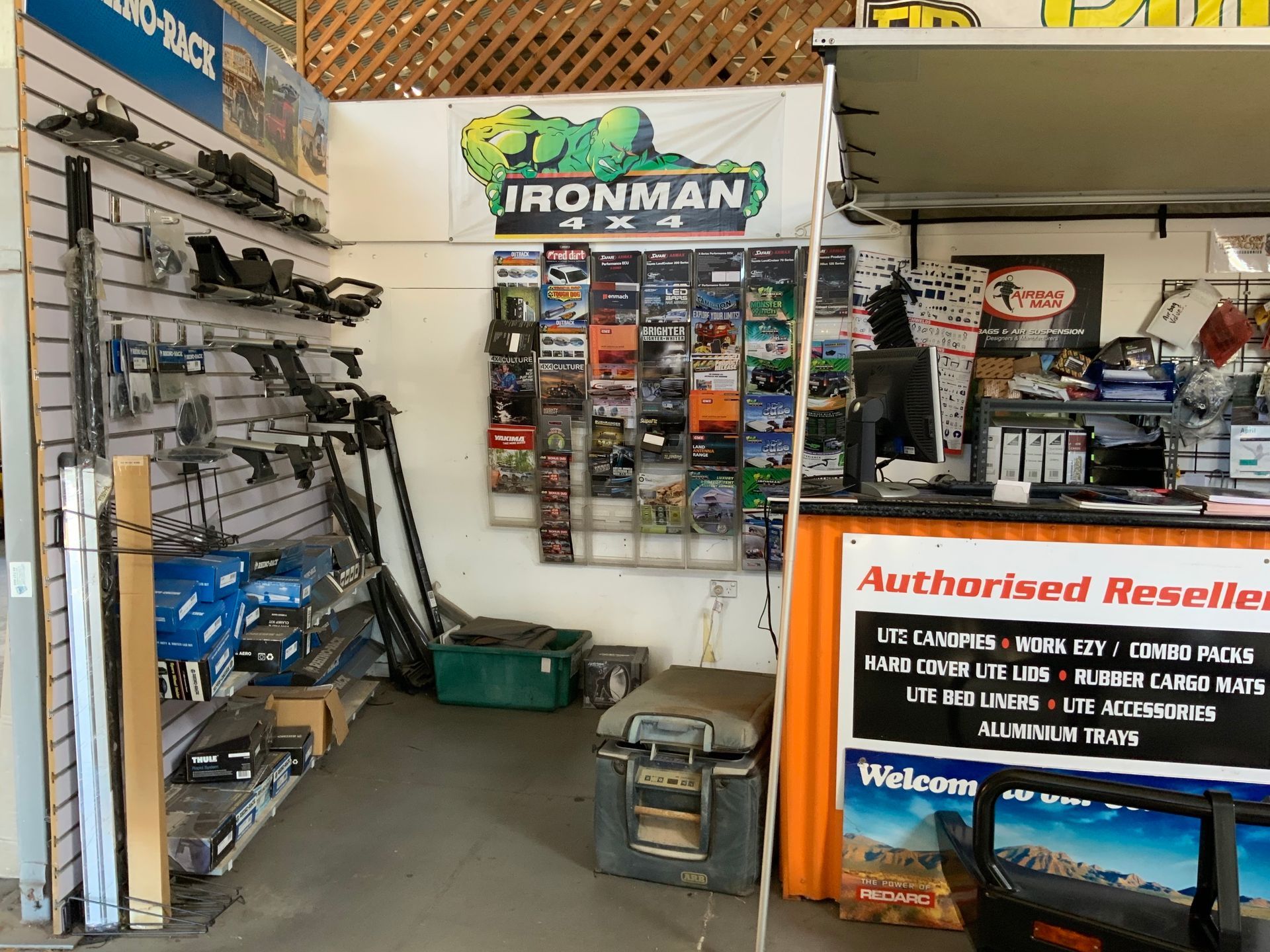 Interior of an Auto Parts Store; Shelves With Parts, Ironman Logo — Stay on Track 4X4 Accessories in Gladstone Central, QLD