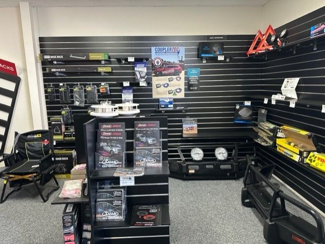 Interior of a Retail Store With Black Display Shelves Stocked  — Stay on Track 4X4 Accessories in Gladstone Central, QLD
