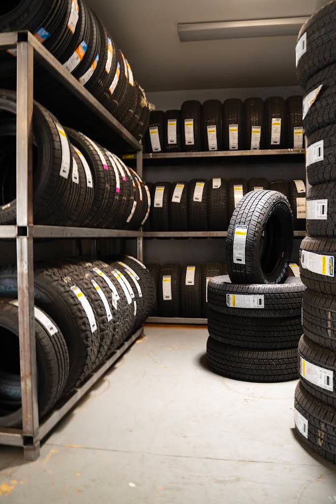 Shelves of several tires for sale | Big Apple Automotive