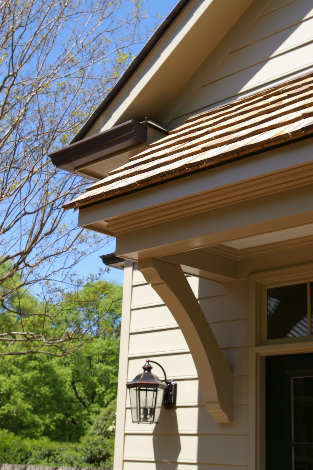 A house with a lantern on the side of it