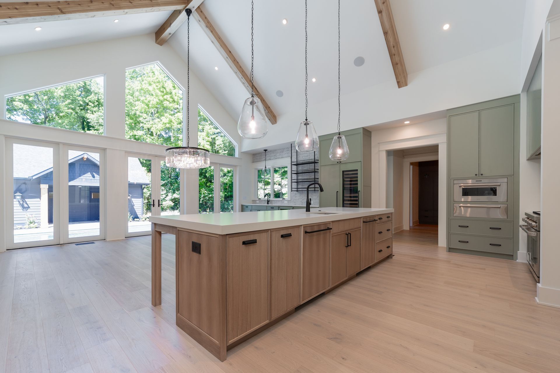There is a large island in the middle of the kitchen.