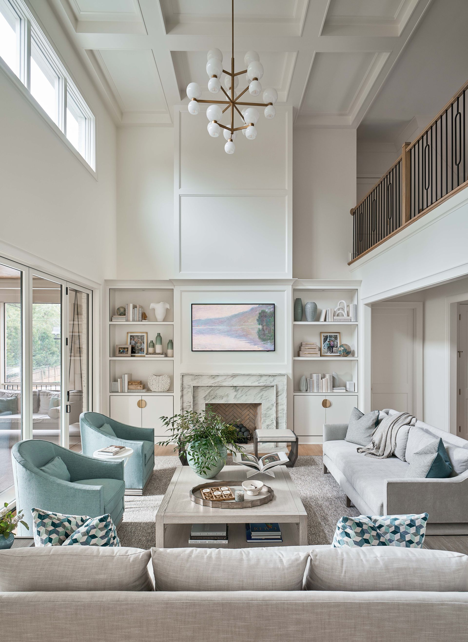 A living room filled with furniture and a fireplace.