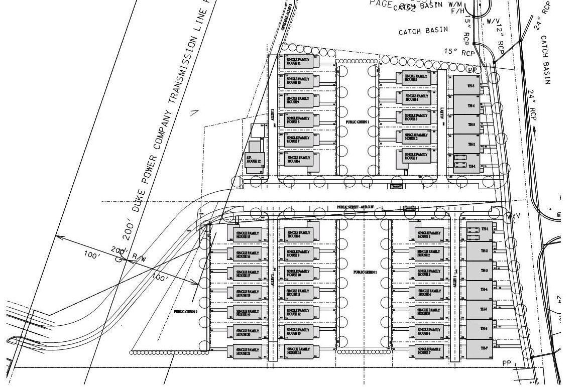 A black and white drawing of a building with a lot of windows