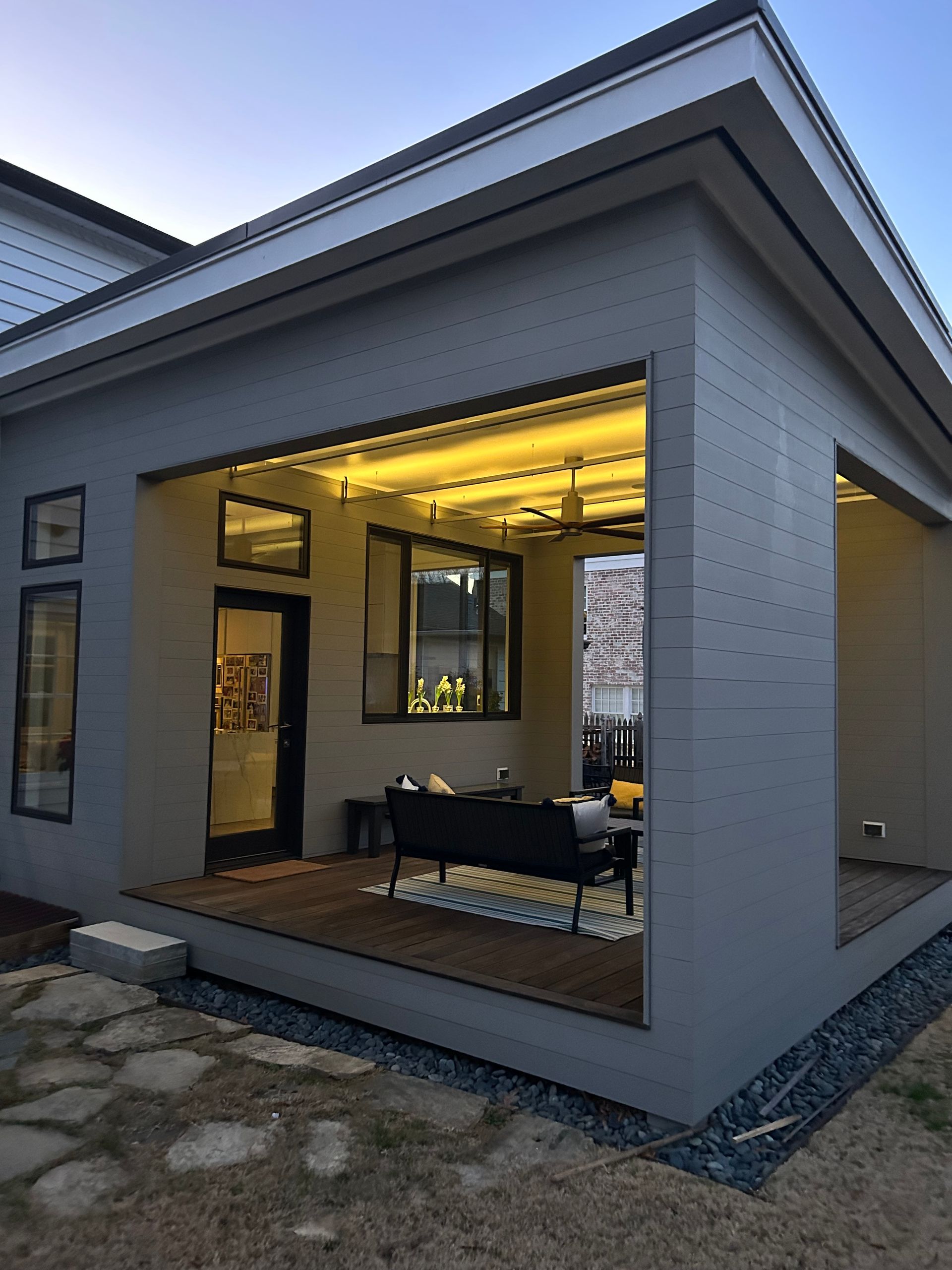 A house with a porch and a couch on it