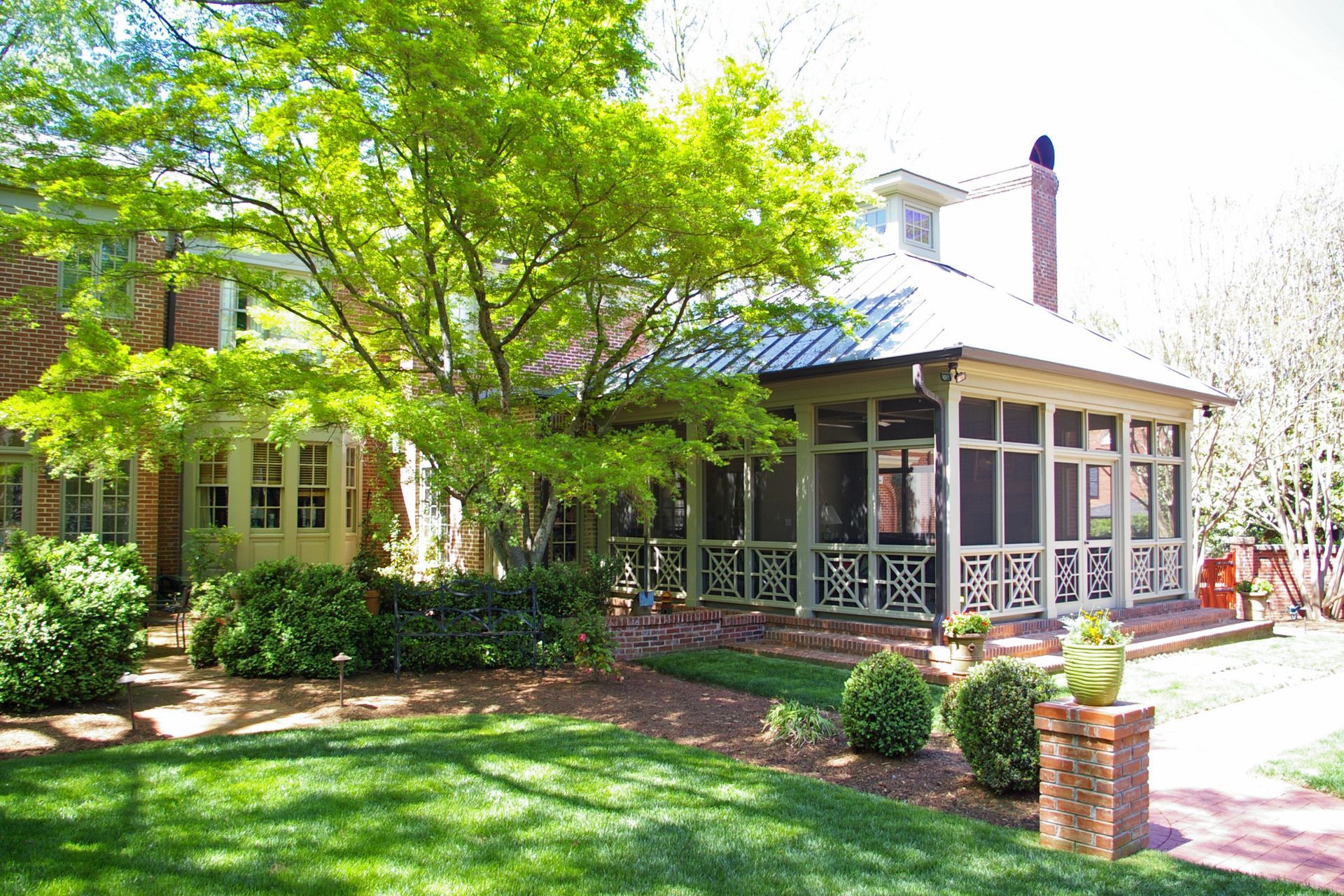 a row of houses with porches in a residential neighborhood