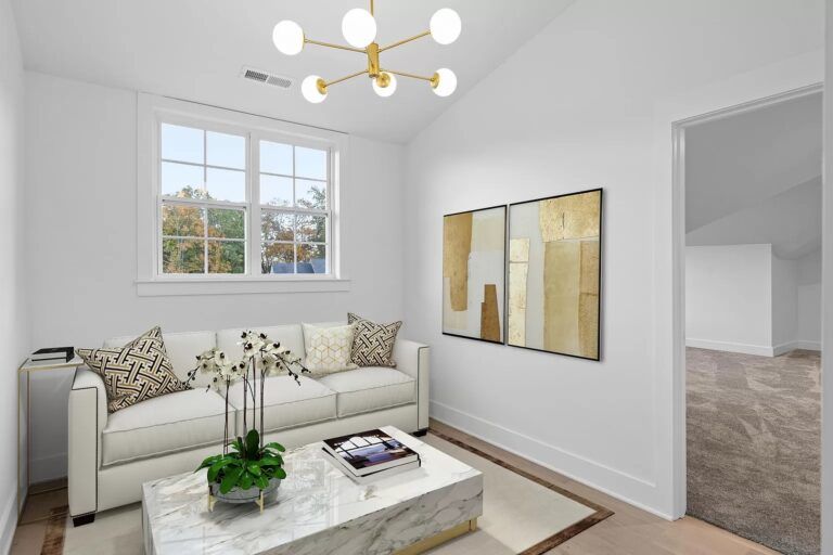 A living room with a couch and a coffee table.