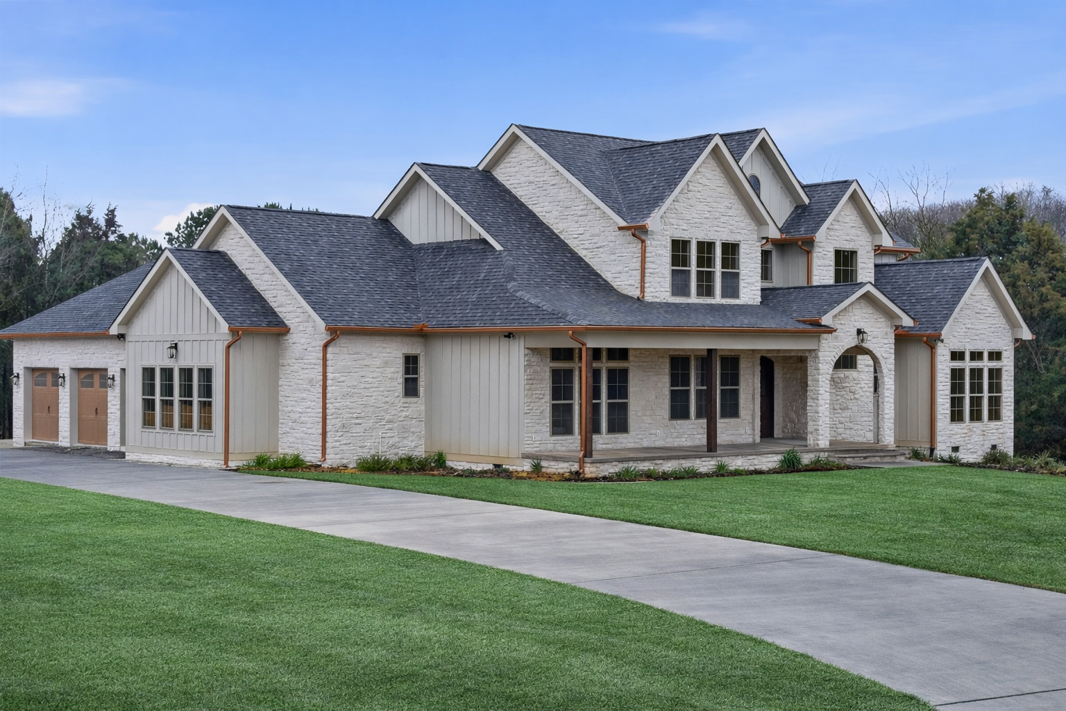 A house with a green siding and a black roof is for sale.