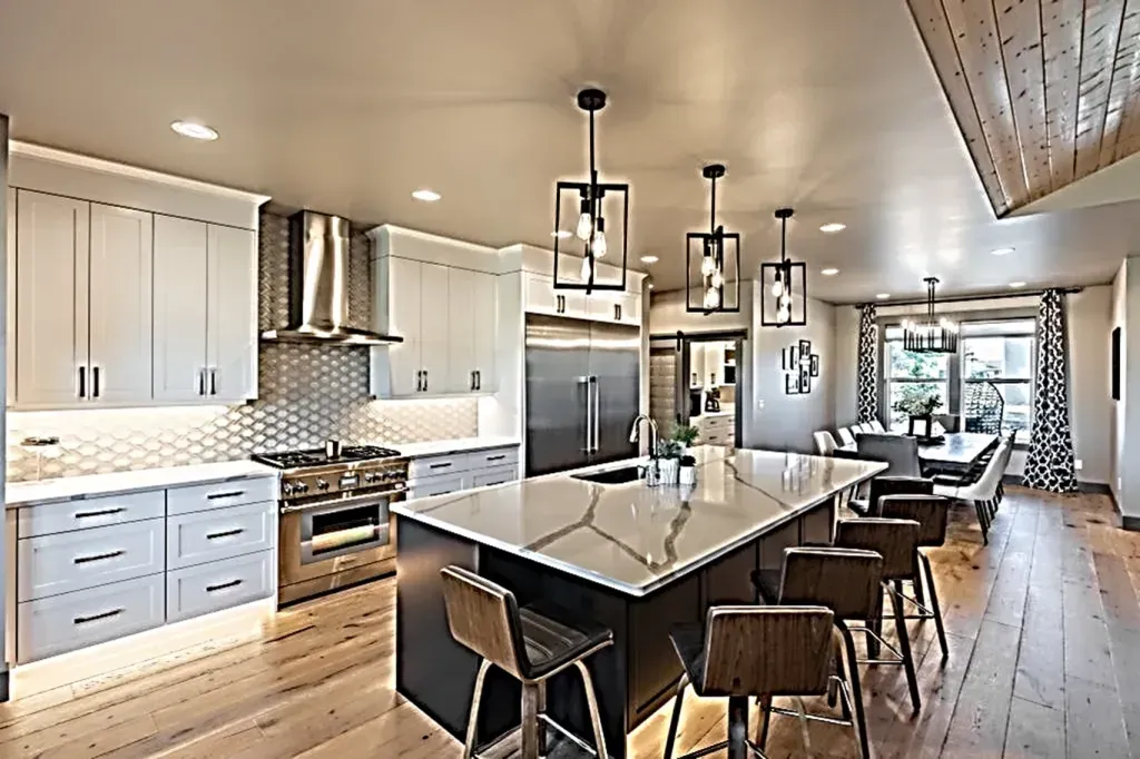 There is a large island in the middle of the kitchen.