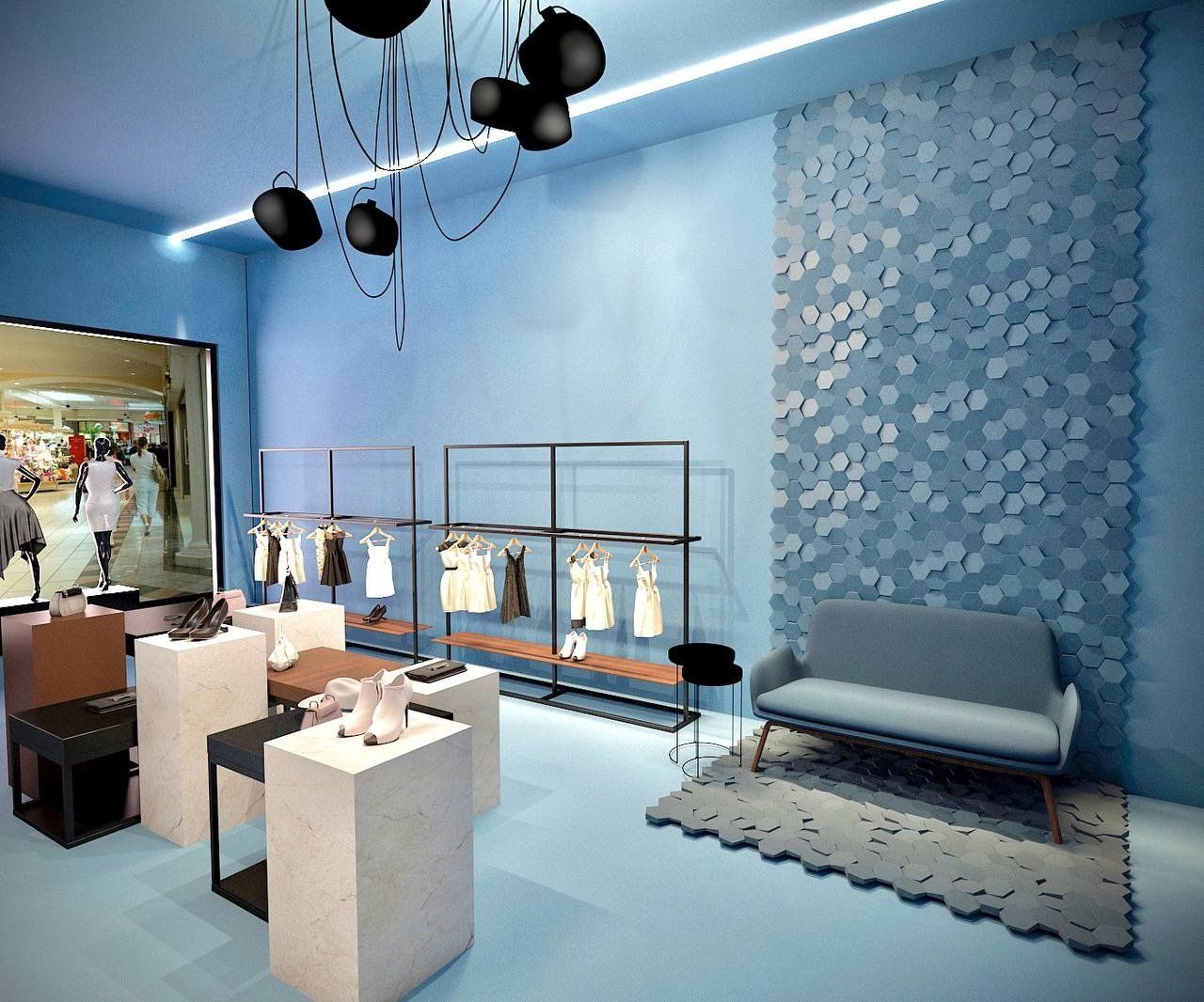 Eine Darstellung eines Bekleidungsgeschäfts mit blauen Wänden und einer Couch