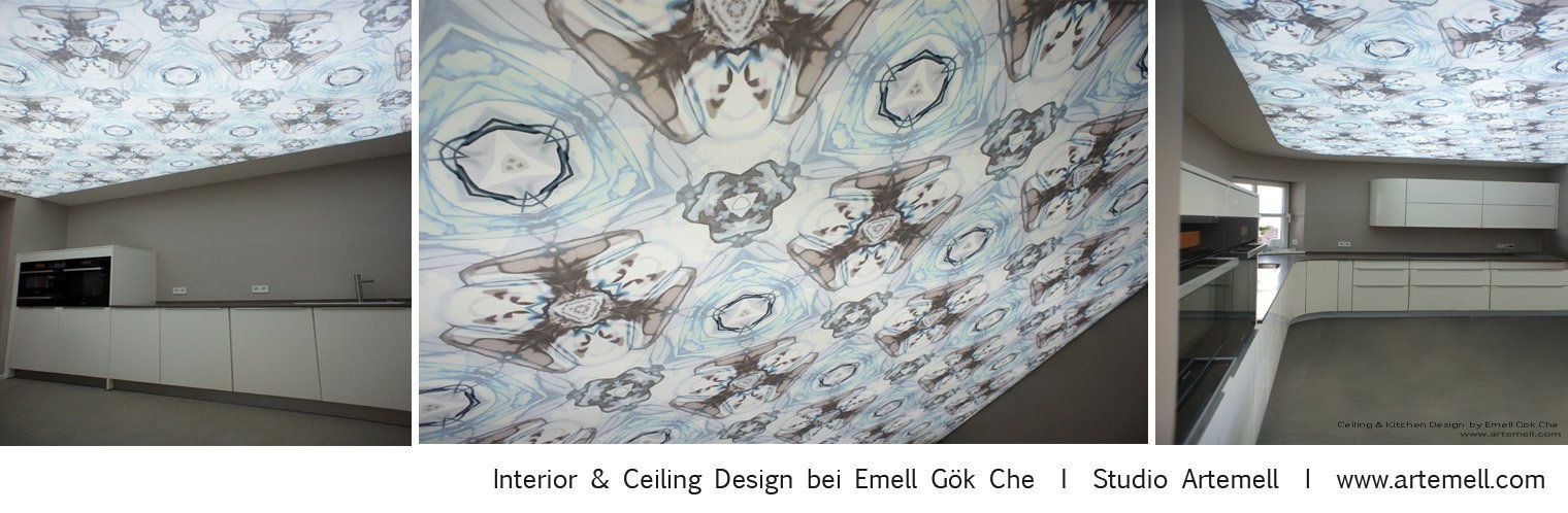 Eine Küche mit einer Decke, die ein Muster aufweist