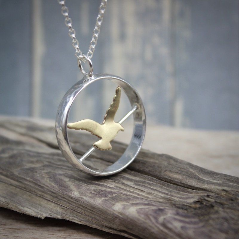 Bird On A Wire Sterling Silver & Brass Pendant Necklace