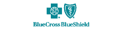 A blue cross blue shield logo with a cross and shield
