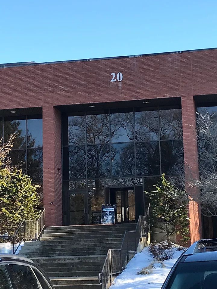 A brick building with the number 20 on it