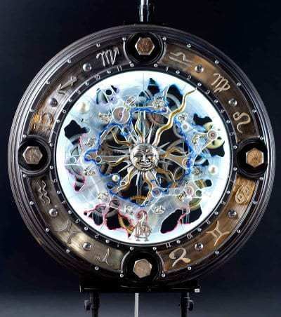 A clock with the zodiac sign virgo on it