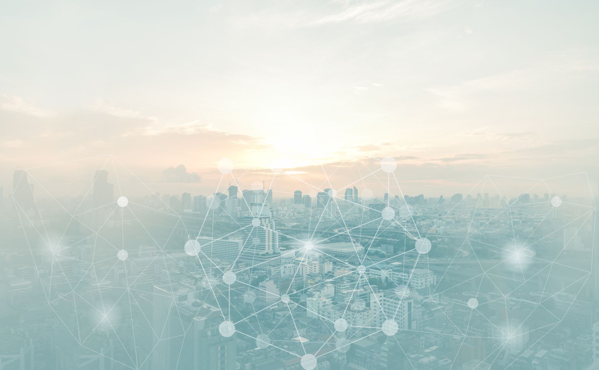 Cityscape overlaid with a network of connecting nodes, suggesting data flow. Overcast sky.