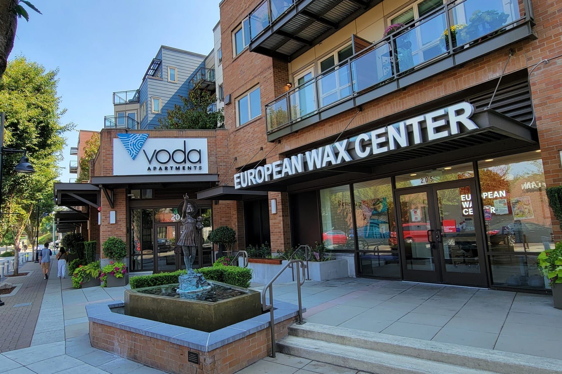 A building with a sign that says european wax center on it.