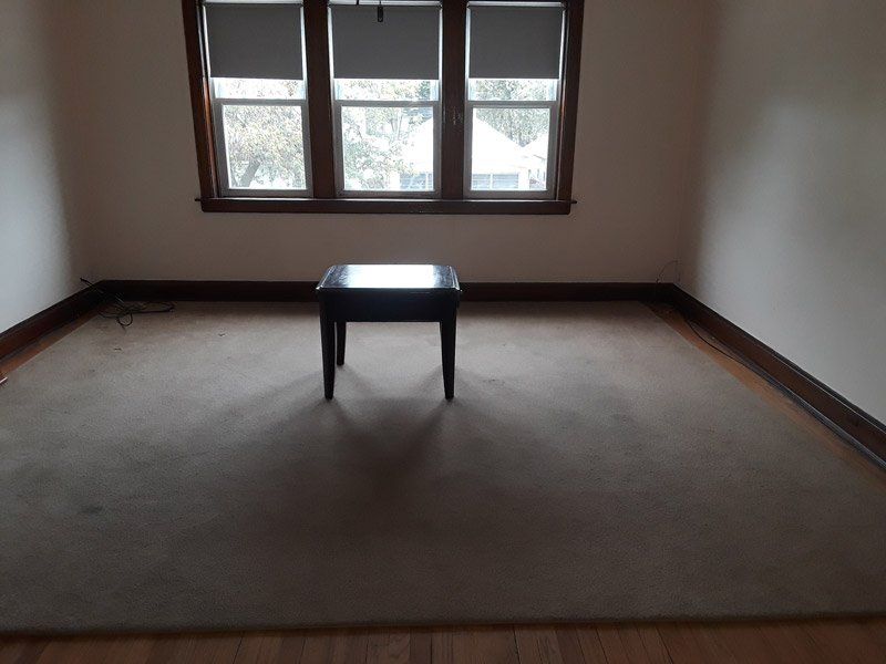 Room with Chair — Elmwood Park, IL — Maria's Cleaning Services at Elmwood Park