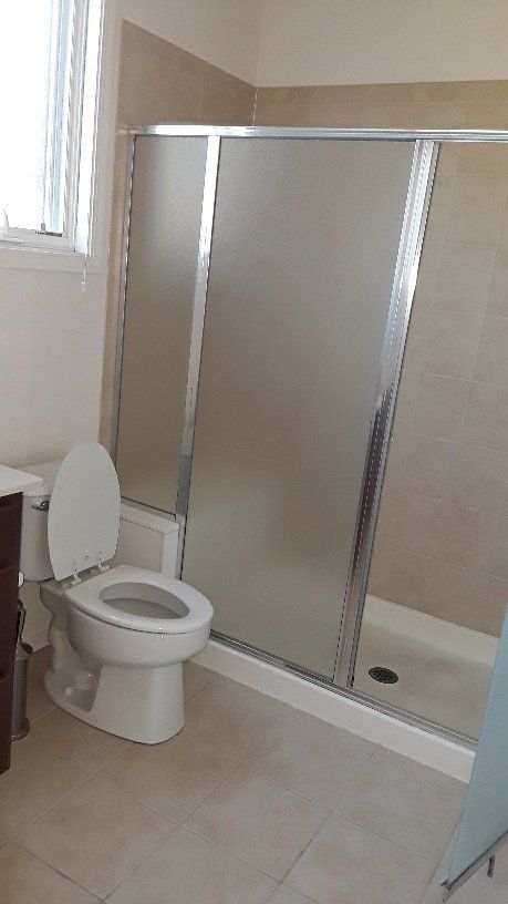Bathroom with Shower Enclosure — Elmwood Park, Illinois — Maria’s Cleaning Services at Elmwood Park