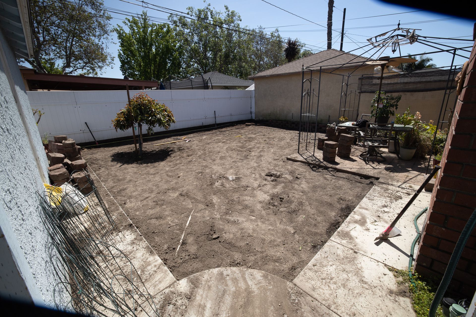 back yard before installing fake grass