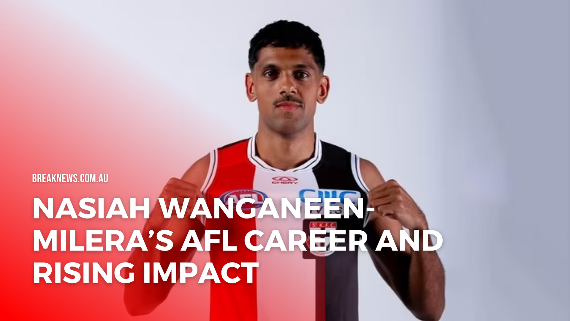 Nasiah Wanganeen-Milera wearing St Kilda AFL jersey posing for team photo