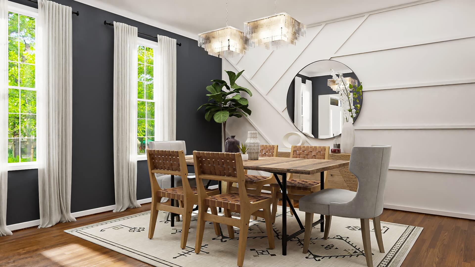 A dining room with a table and chairs and a mirror on the wall.
