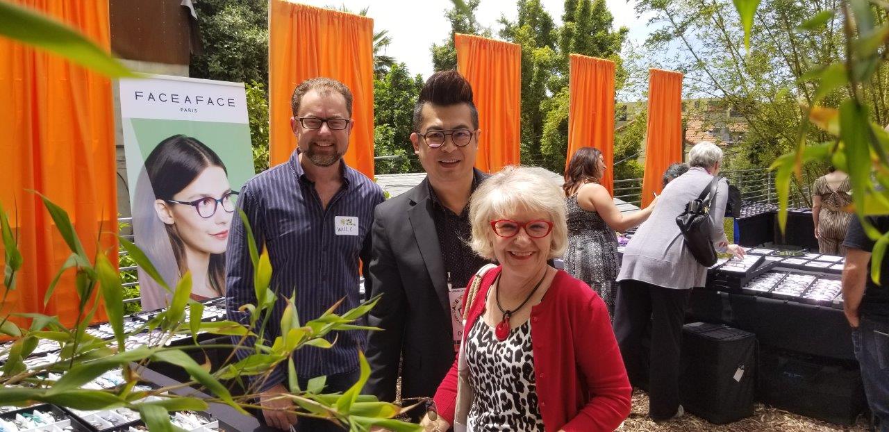 4 People standing outside posing at  frames at Raise Your Glasses 2019 Event
